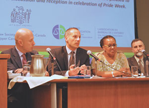 Event organizer Milé Komlen, immigration lawyer Michael Battista, Lisa Gore of the 519 Community Centre, and Sam Laredo of the Immigration and Refugee Board of Canada at the LSUC pride panel. Photo: Gail J. Cohen