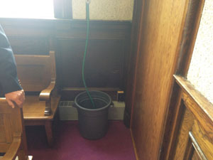 Janet Whitehead found hoses and tarps among the makeshift solutions to a leaky roof at the courthouse in Fort Frances during her recent tour of northern Ontario.