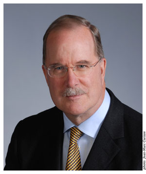 Litigants who want to appear in a particular language often face ‘additional costs and delays,’ says Graham Fraser.