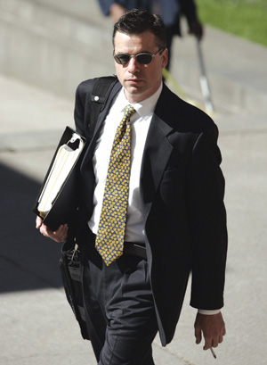 Photo: Brent Foster/National Post.  Counsel for Andrew Rankin, seen arriving here for court in May, says the former investment banker has already been 'hugely punished.'