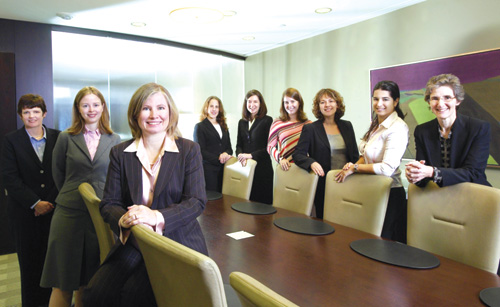Photo: David Batten.  Lori M. Duffy, front, and some of the members of WeirFoulds Women, a group of about 26 lawyers who get together to discuss client and professional development.