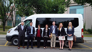 Law students from the University of Calgary prepare to board the Justice Bus. Photo credit: Roch Labelle